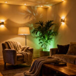 A beautifully lit cozy living room featuring ambient, task, and accent lighting, creating a warm, layered, ethereal glow and inviting atmosphere.