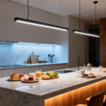 Modern kitchen island with dynamic tunable white circadian lighting transitioning from bright cool to warm soft light, featuring pendant lights and under-counter LEDs over natural stone and wood surfaces.